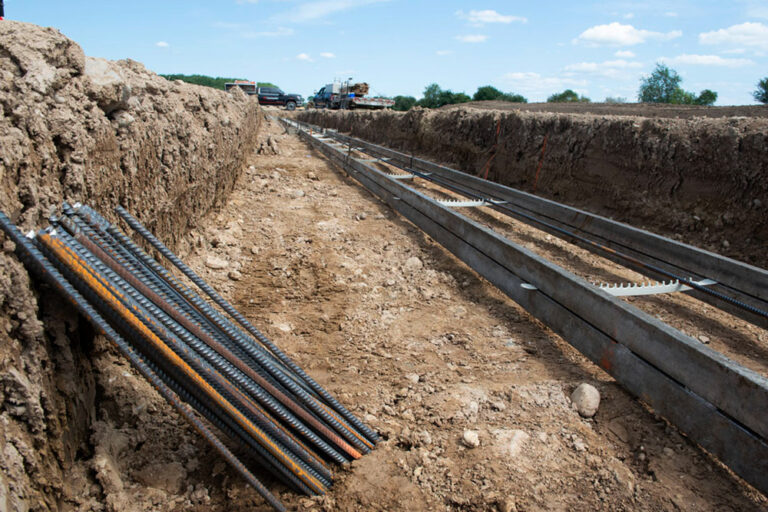 Forming for concrete foundations and footers with concrete rebar