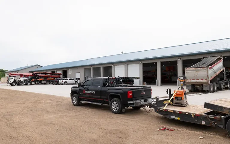 Countryside Shop view with trucks